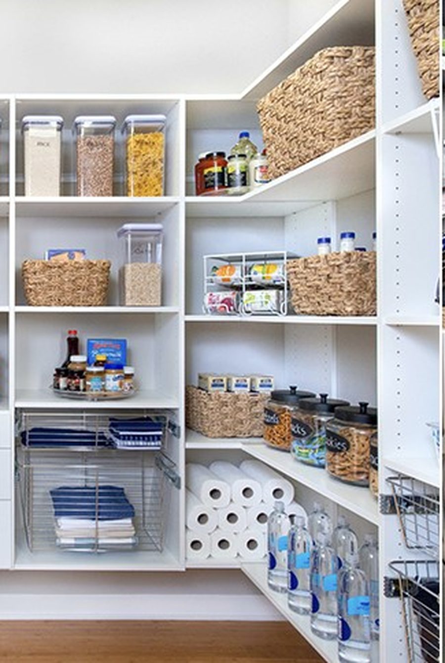 Custom walk-in pantry with open shelving and pull-out storage