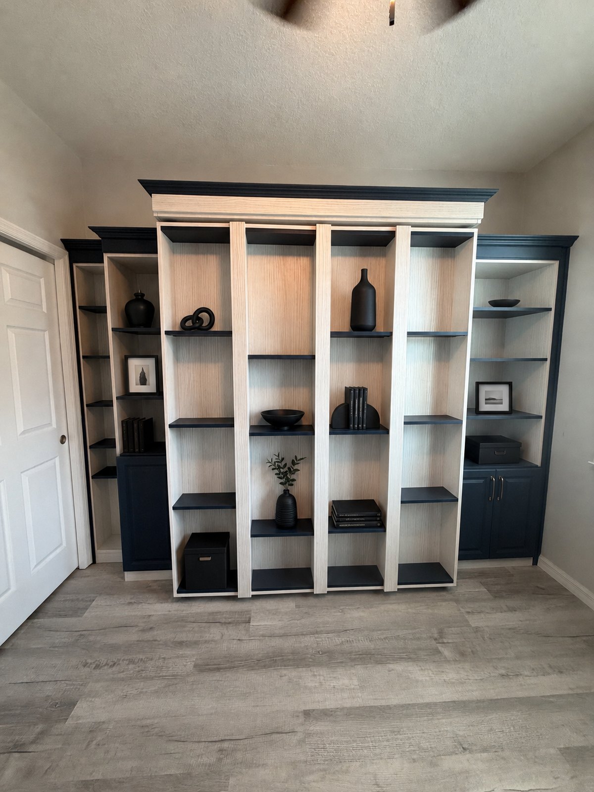 Custom entertainment and storage wall unit by Create More Space
