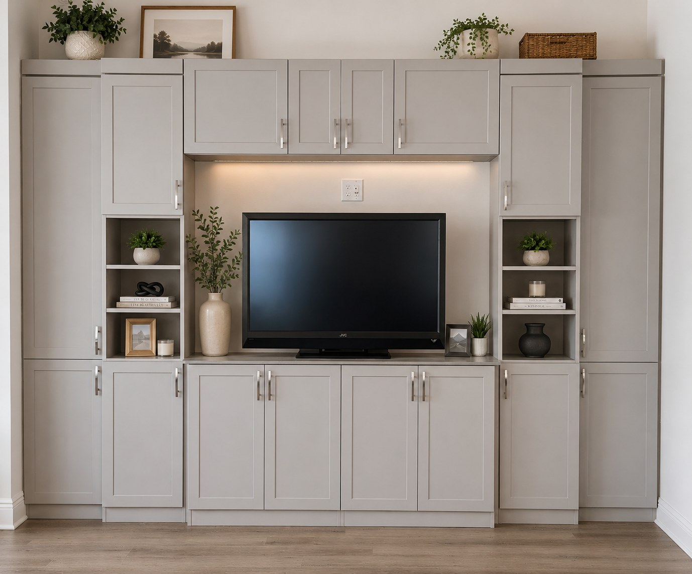 Greige entertainment center with display towers and TV by Create More Space