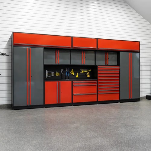 Metal garage with red and black cabinetry by Create More Space