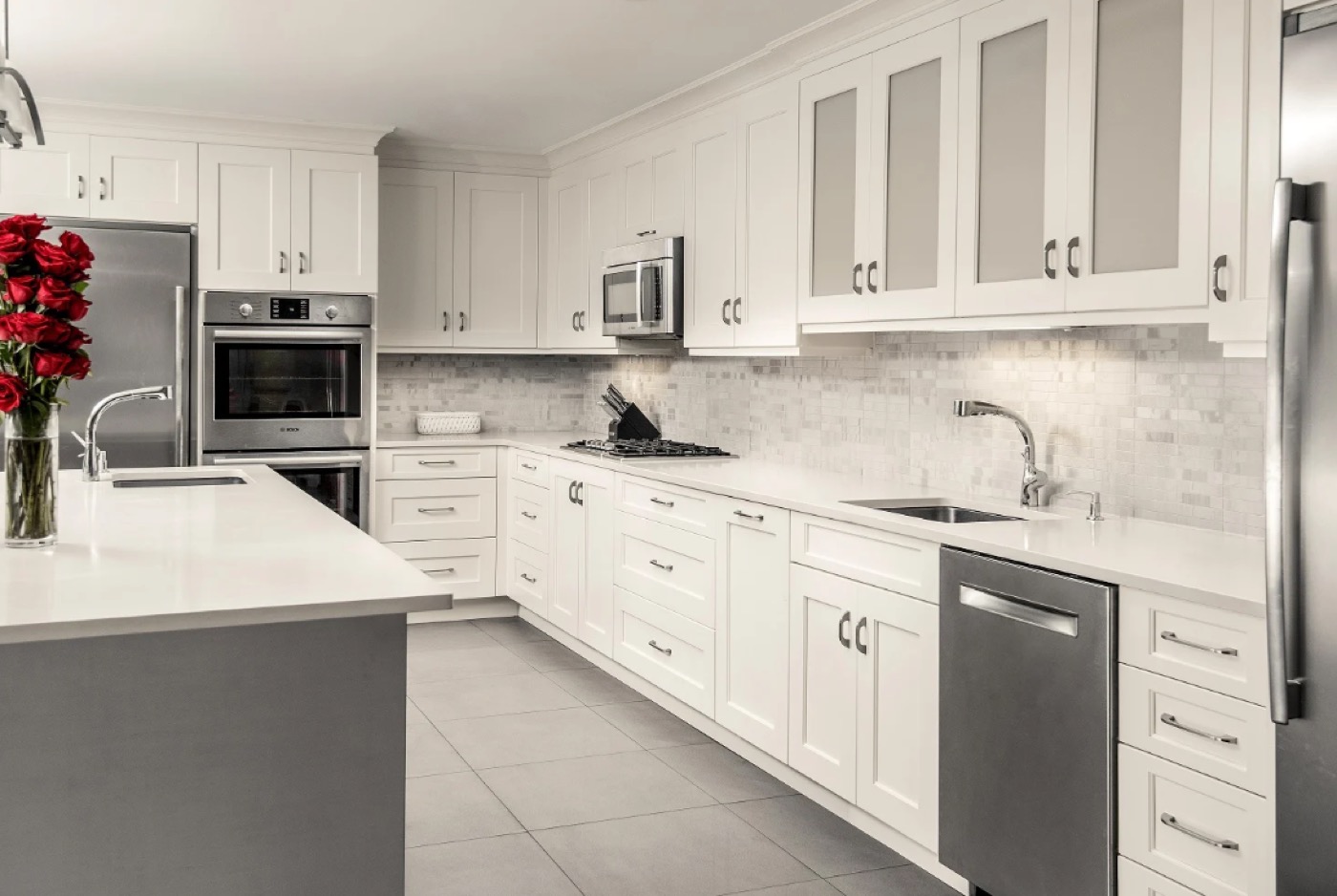 White shaker kitchen with marble backsplash by Create More Space