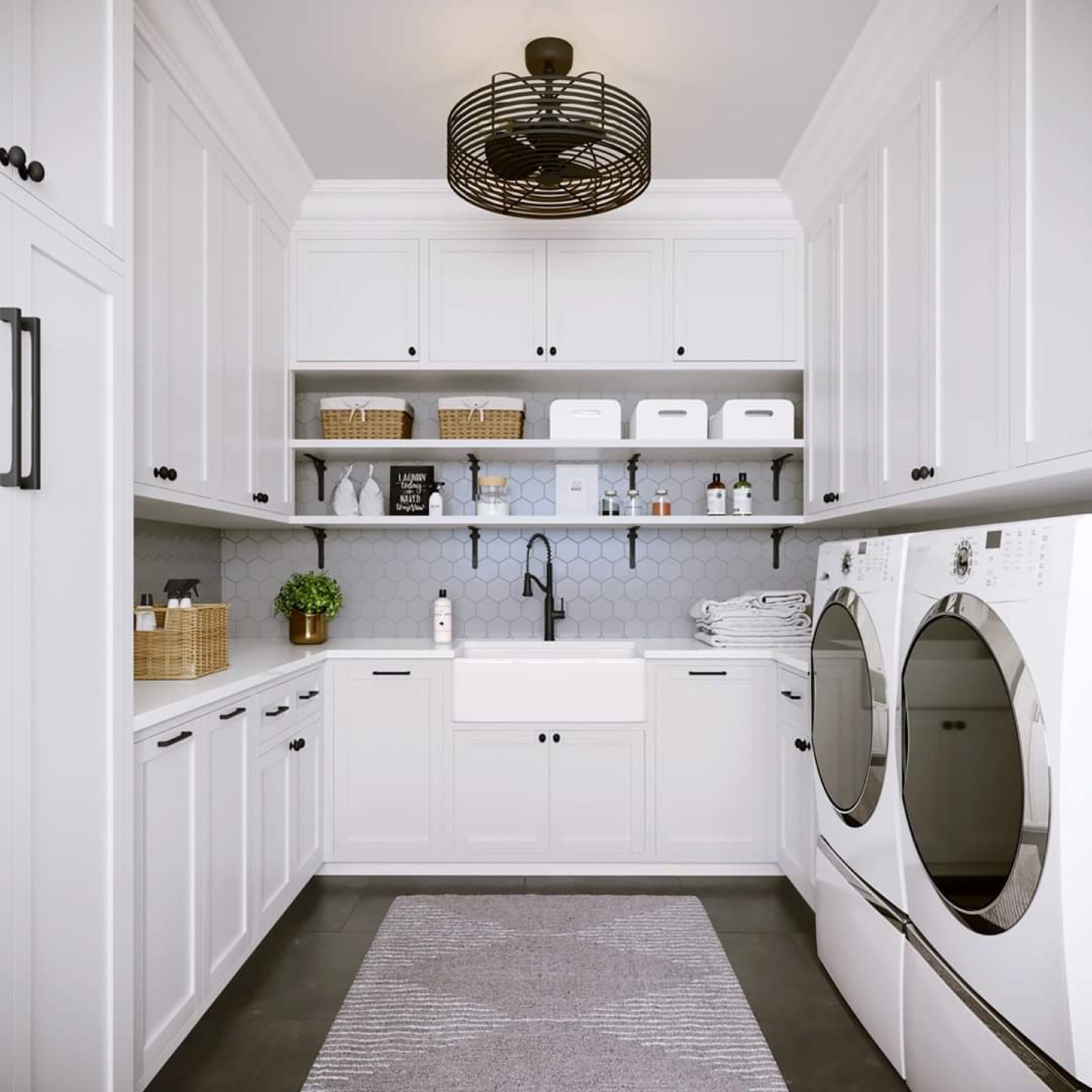 Custom laundry room with cabinetry, counter and hanging storage