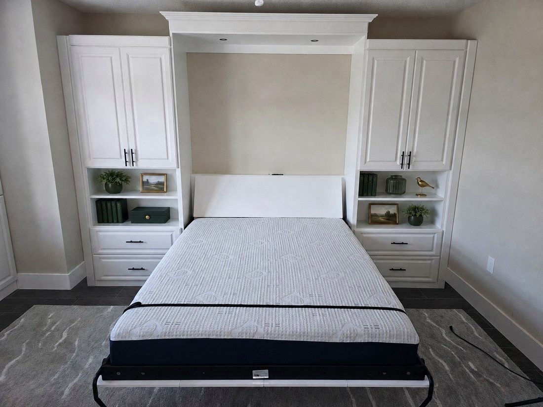Built-in wall bed with integrated desk and shelving, installed by Create More Space
