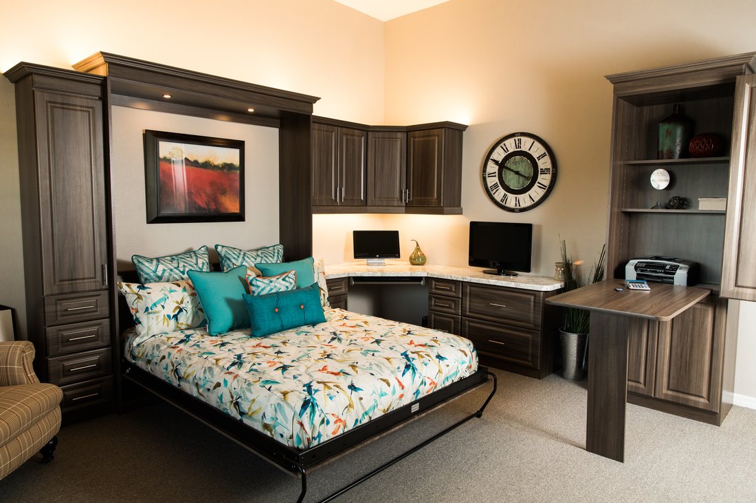 Wall bed with flanking storage towers