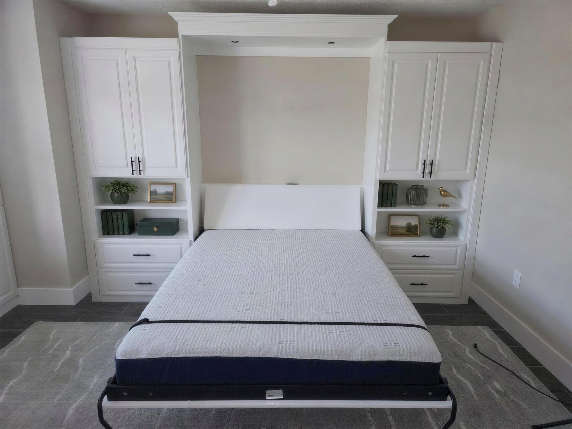 Built-in wall bed integrated into custom cabinetry