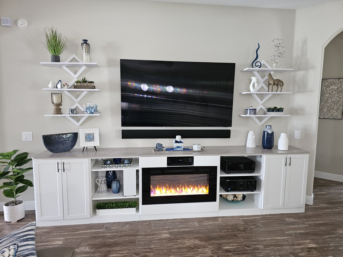 Entertainment center with lit shelving