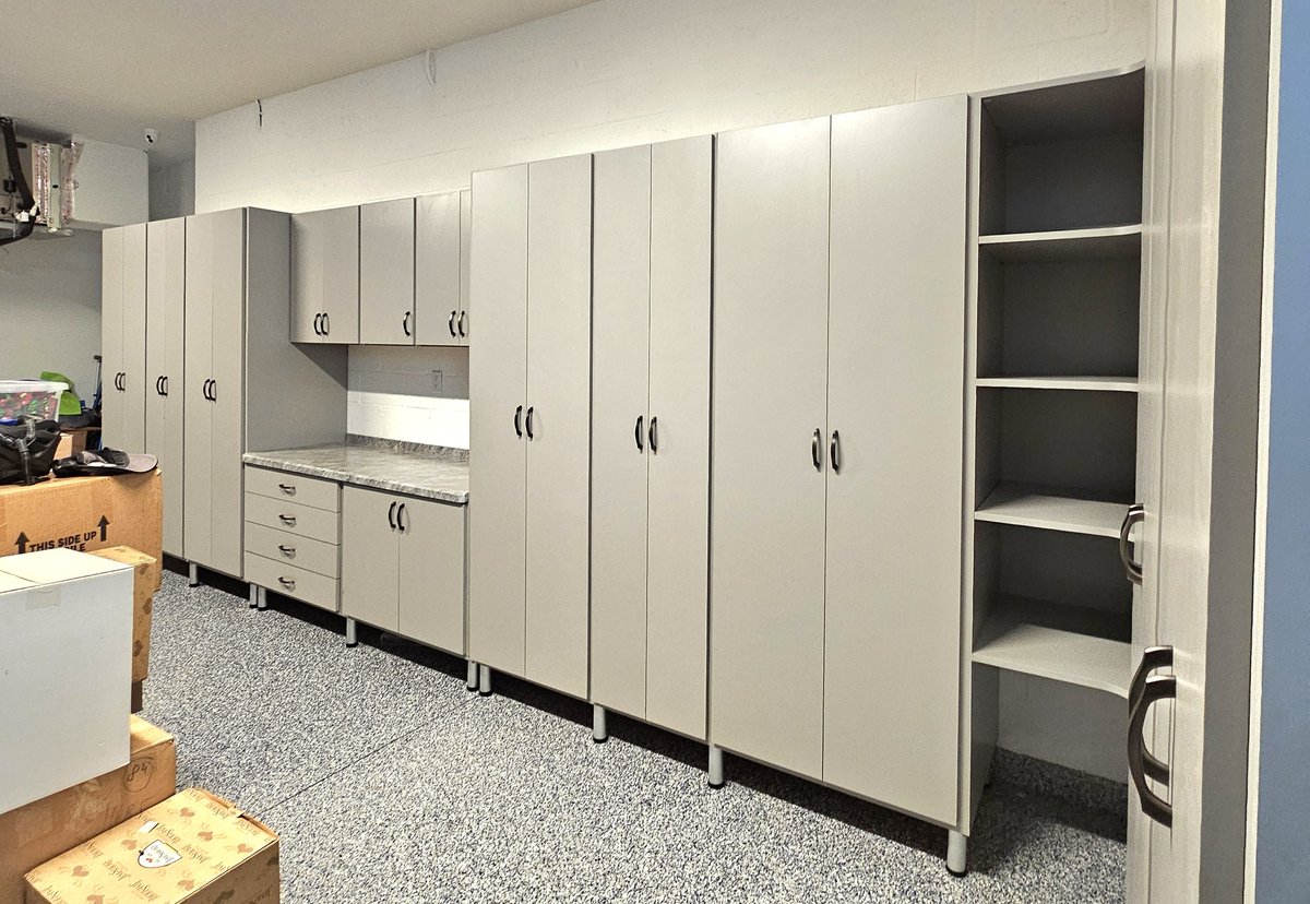 Garage built-in cabinets and workbench by Create More Space