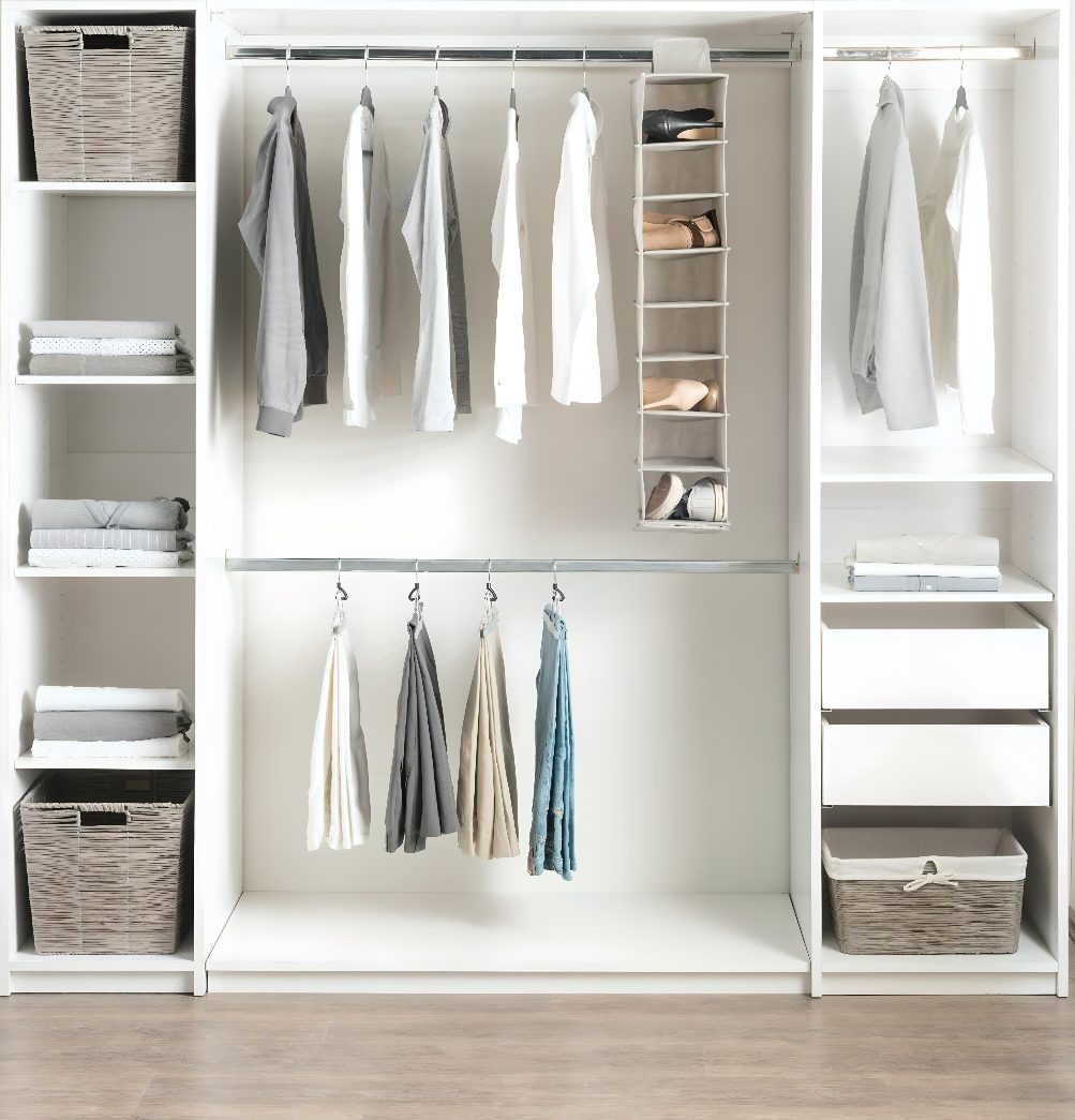 Reach-in closet with double hanging rods, shelving and baskets